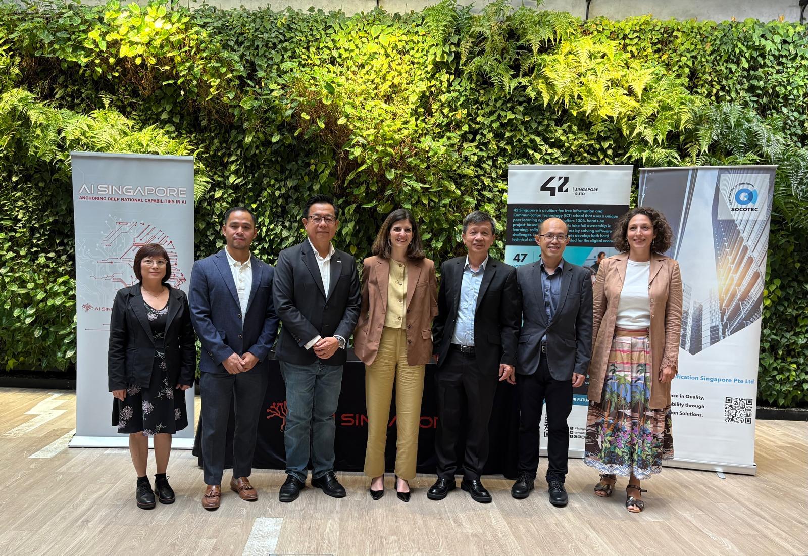 signing of a Memorandum of Understanding (MOU) between SOCOTEC Certification Singapore and AI Singapore (AISG)